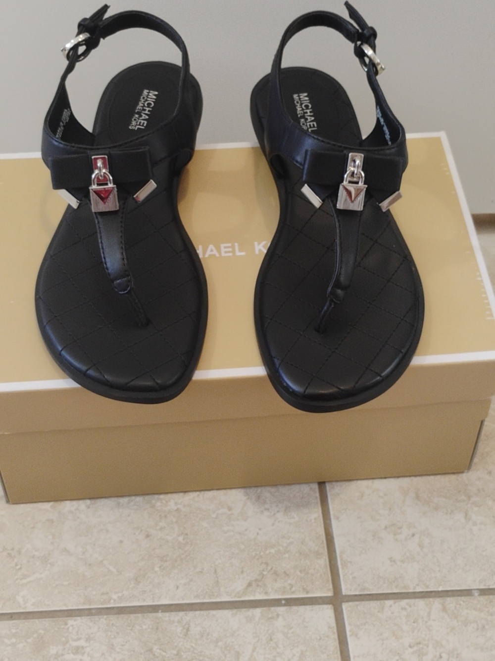 Michael Kors Black Quilted T-Strap Sandals with Silver Hardware